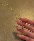 qu カーブリボンネックレス ゴールド 40cm