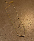 qu カーブリボンネックレス ゴールド 40cm